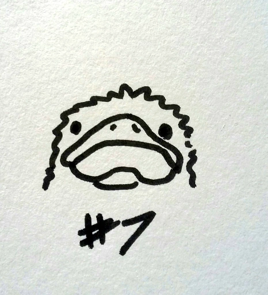 drawing of a simply bird's head facing directly at the viewer